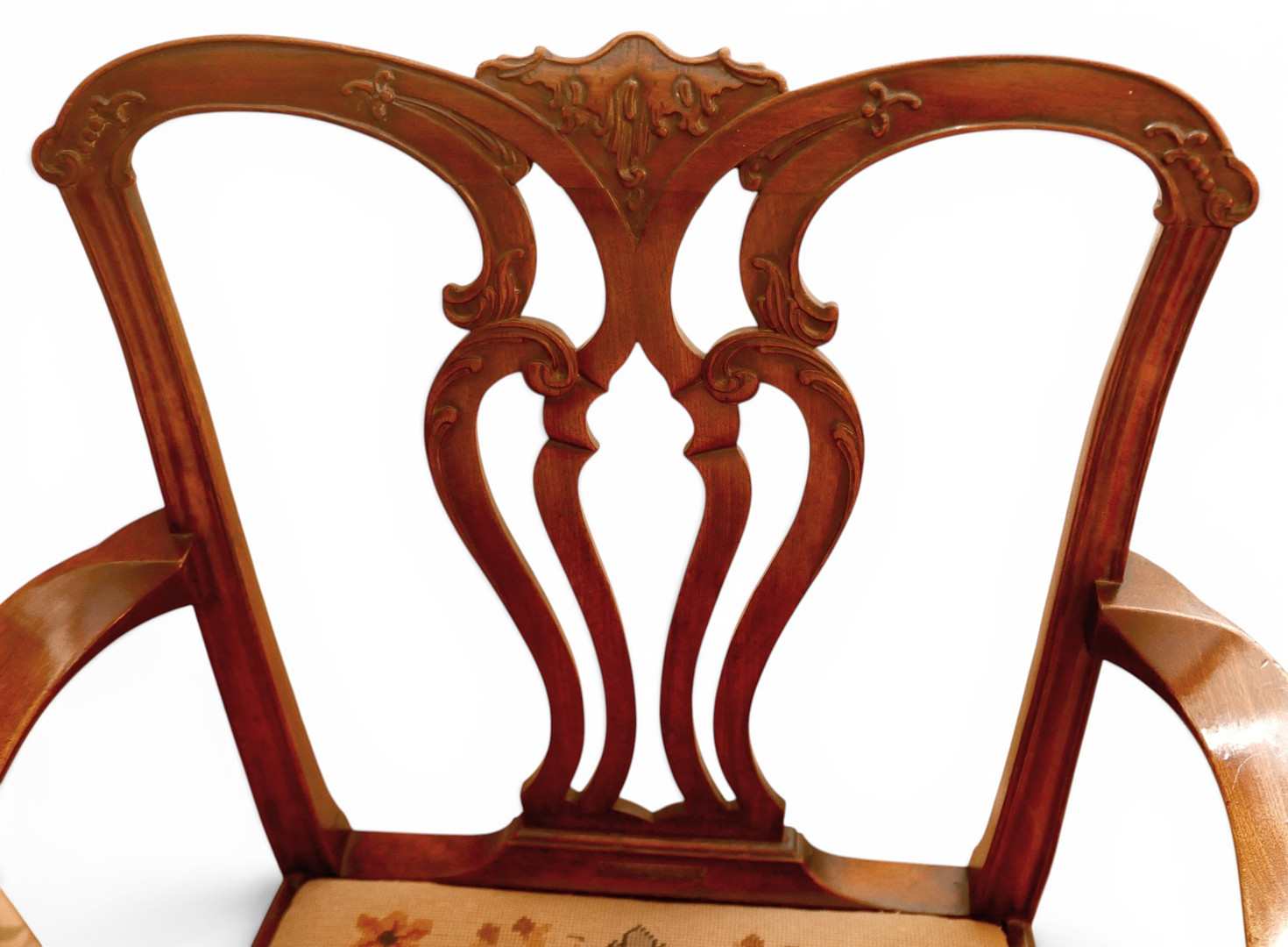 A GEORGIAN MAHOGANY ELBOW CHAIR.