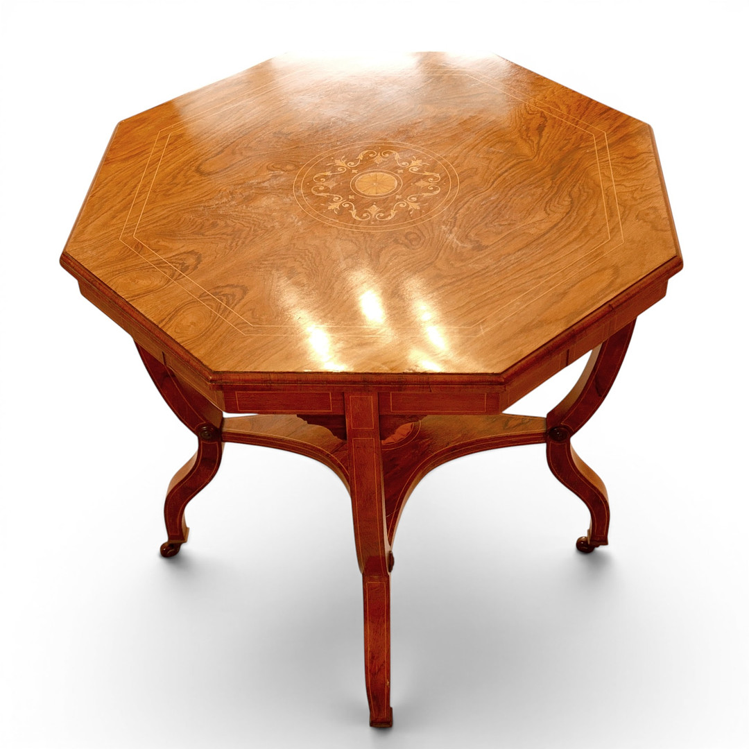 AN EDWARDIAN LINE INLAID ROSEWOOD OCTAGONAL WINDOW TABLE.