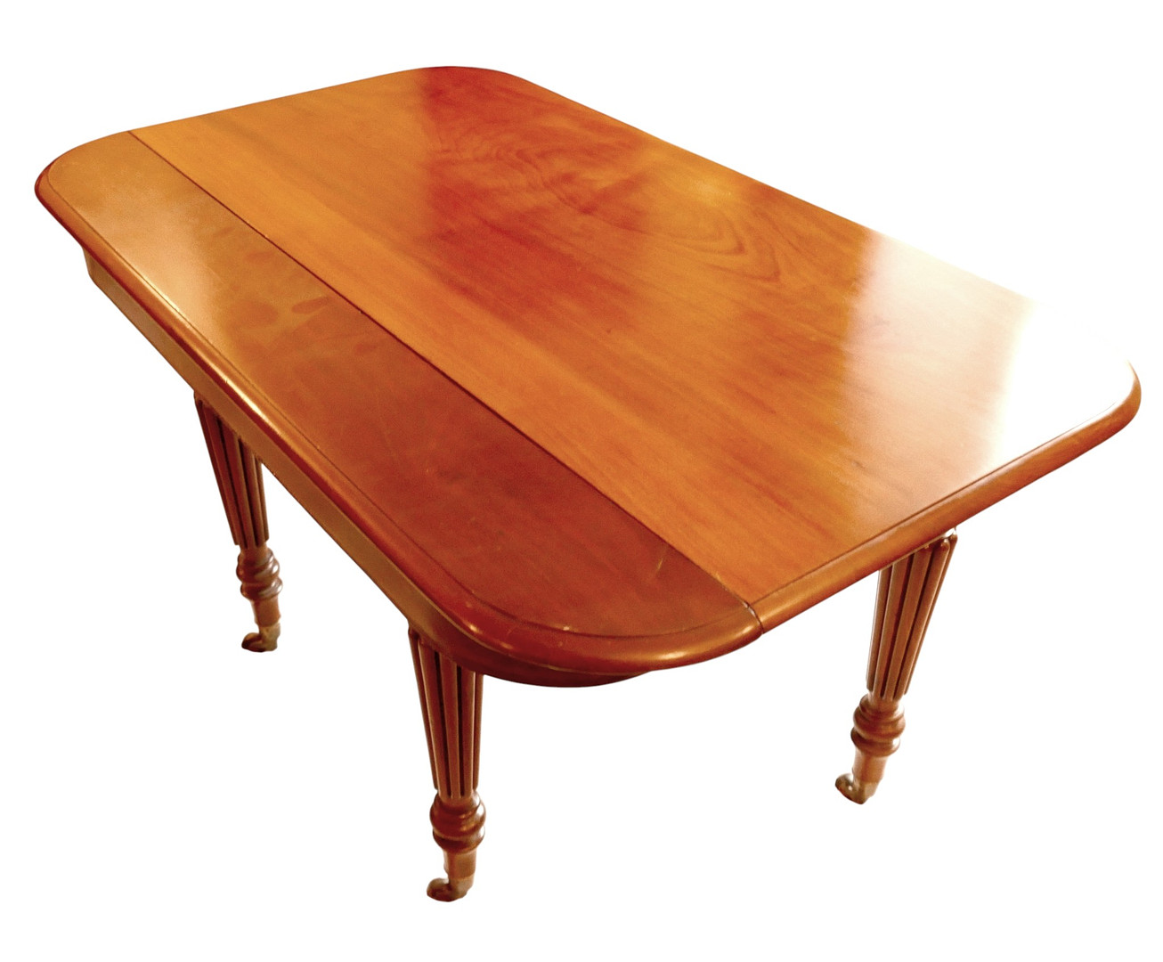 A LARGE 19TH CENTURY MAHOGANY DINING TABLE IN THE GILLOWS STYLE.