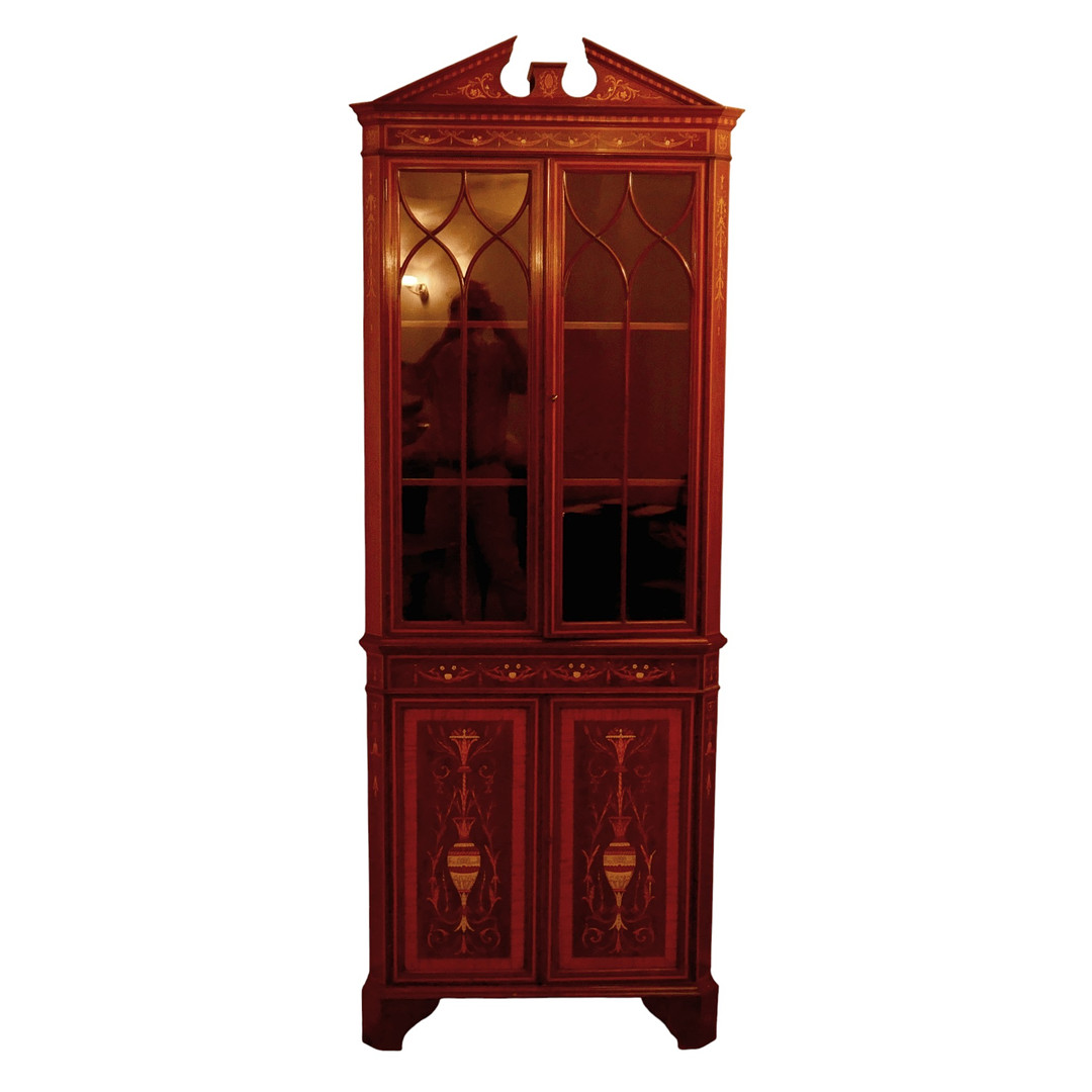 AN EDWARDIAN INLAID CORNER CUPBOARD.