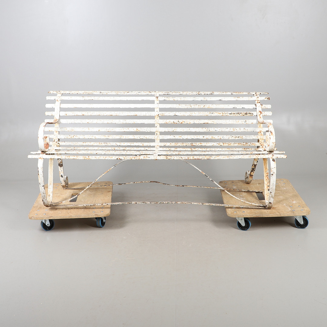 A PAINTED WROUGHT IRON STRAPWORK GARDEN BENCH.