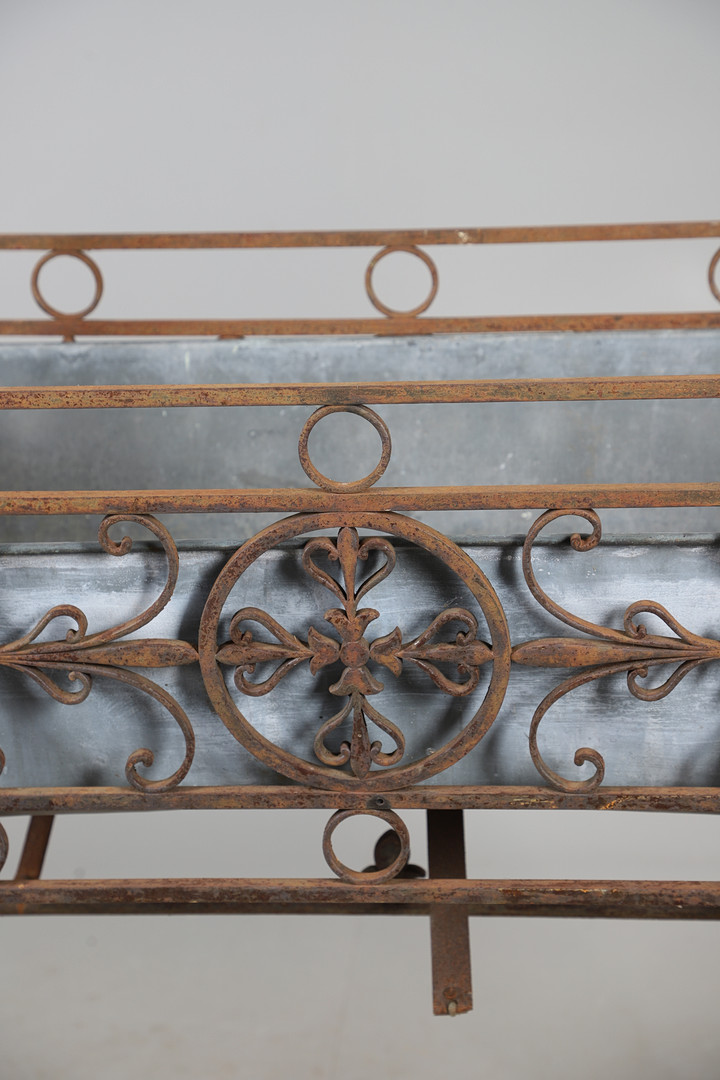 CAST IRON FRENCH CRADLE PLANTER.