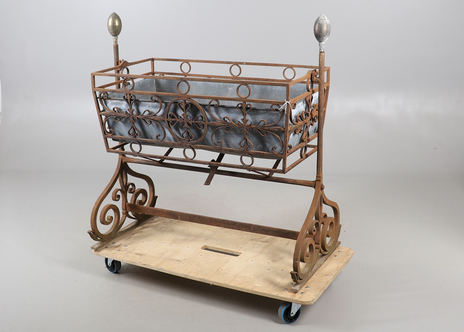 CAST IRON FRENCH CRADLE PLANTER.