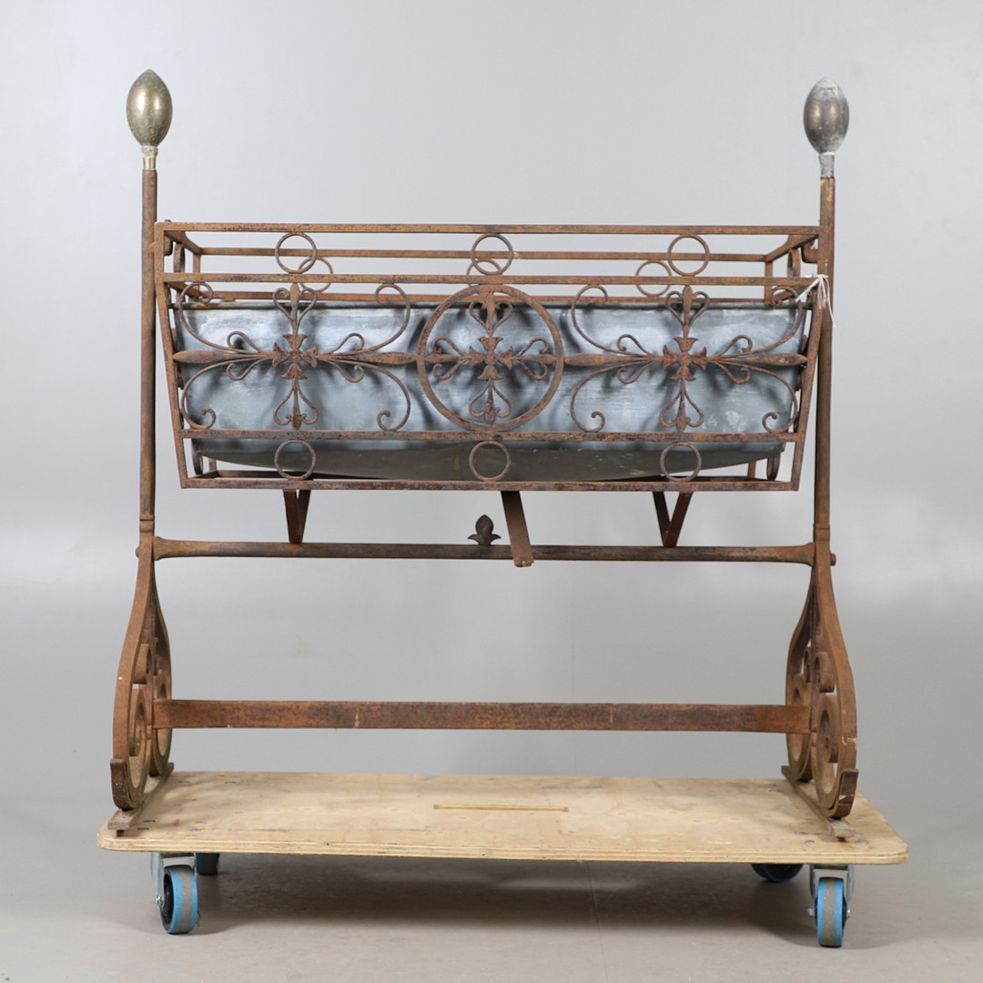 CAST IRON FRENCH CRADLE PLANTER.