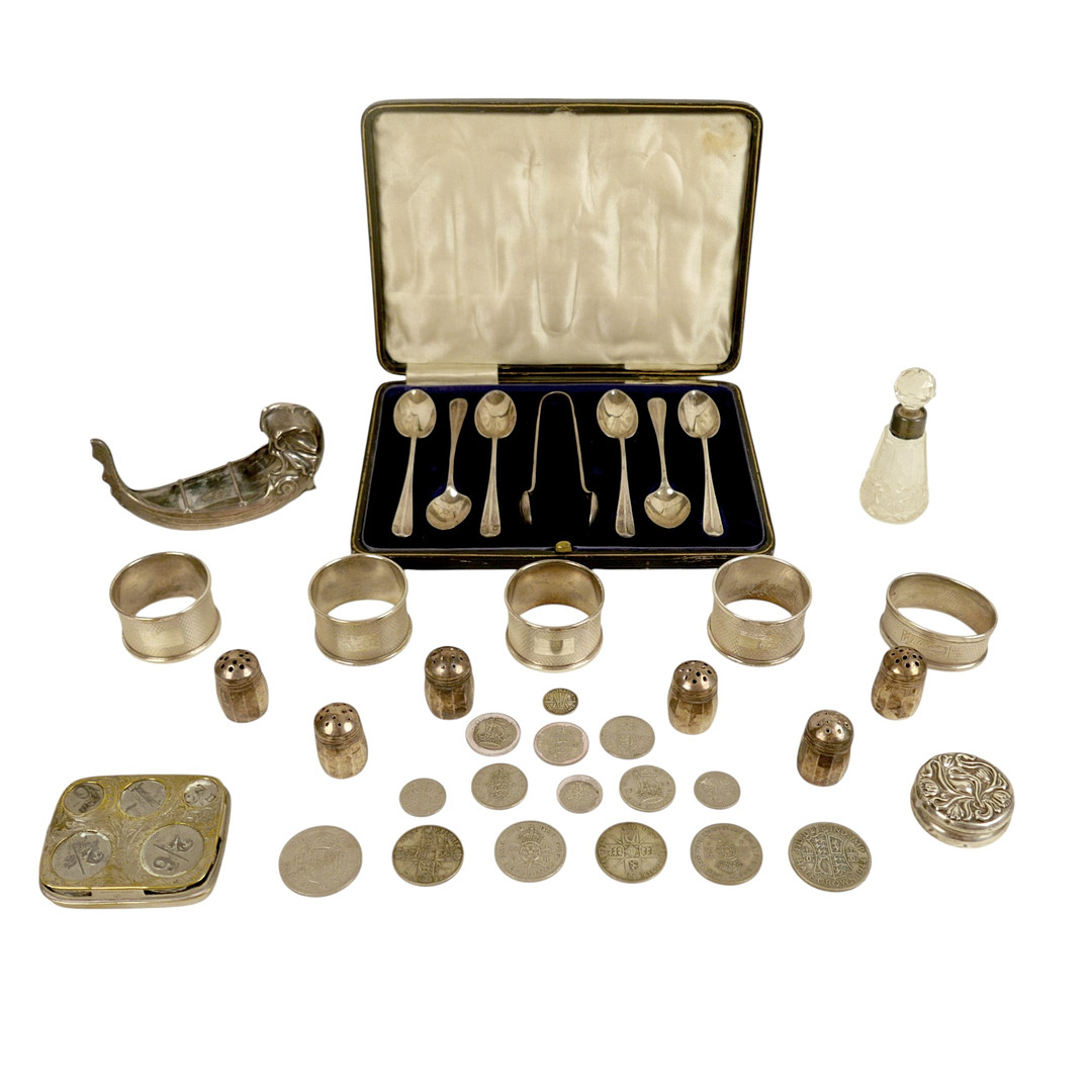 FIVE SILVER NAPKIN RINGS, SIX SILVER MINI PEPPER POTS, SILVER BOAT SALT ETC.