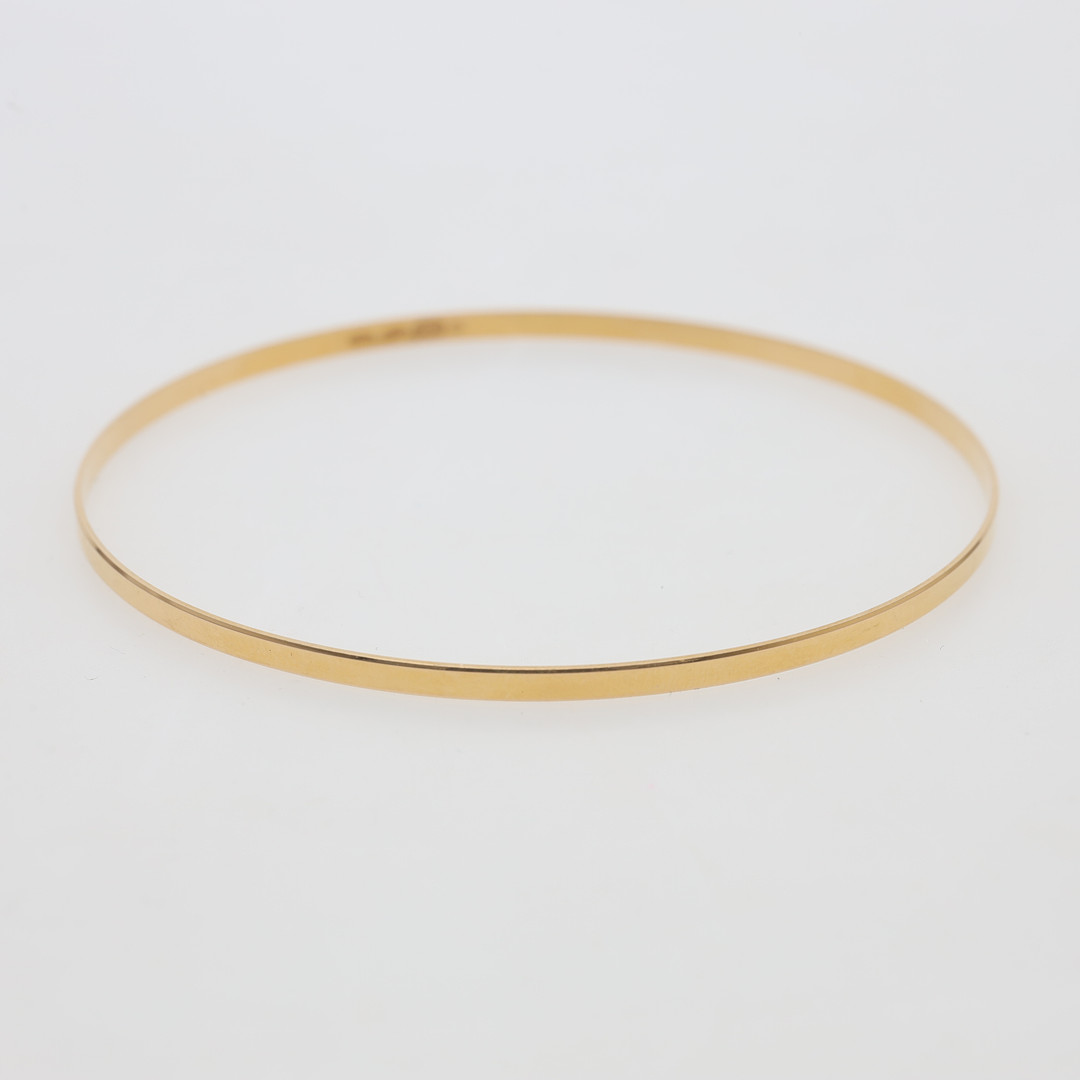 ARMRING 18K guld, vikt ca 4,5 gram.
