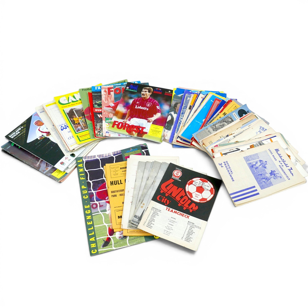 A COLLECTION OF OVER EIGHTY 1950S-1990S BRITISH FOOTBALL PROGRAMMES.