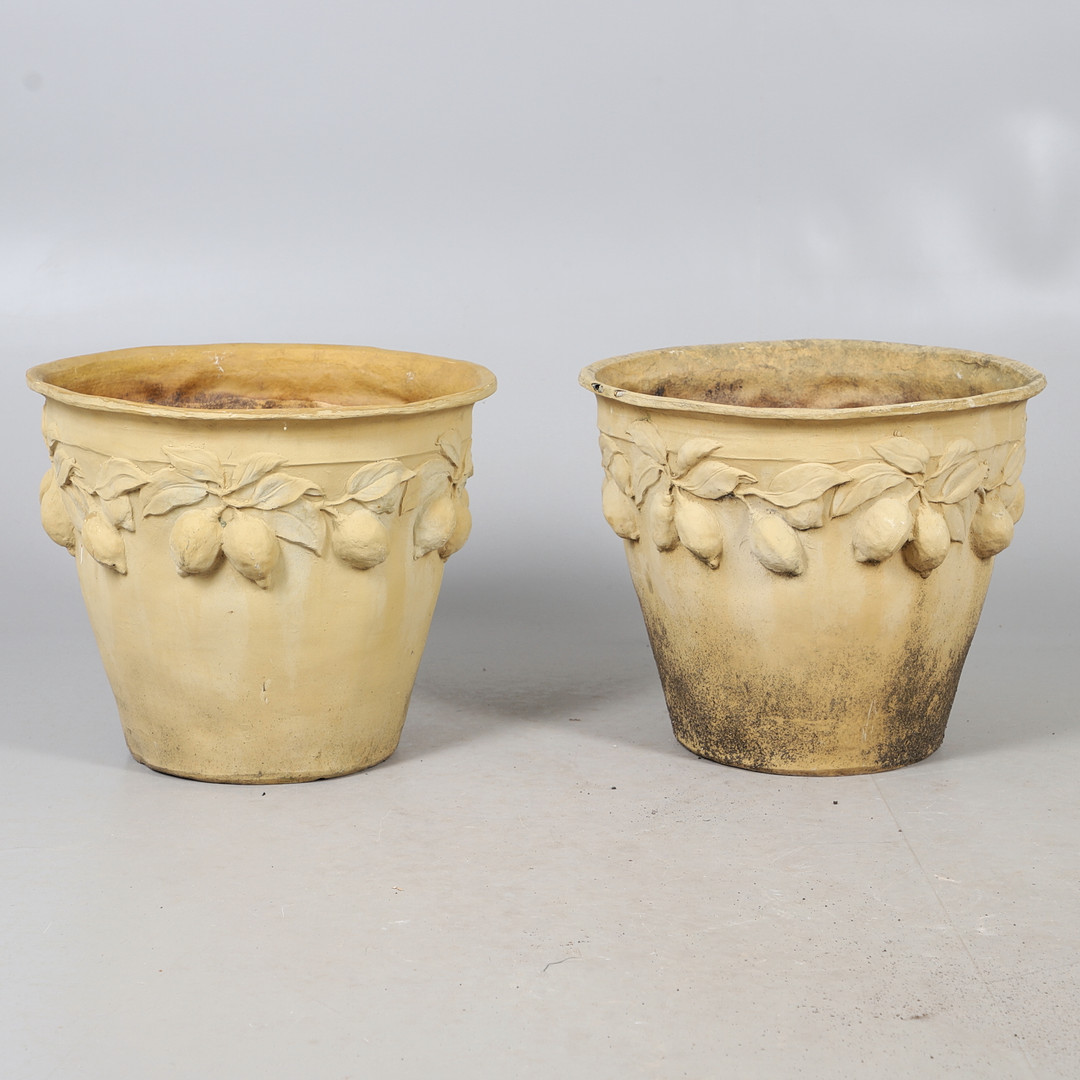 A PAIR OF IMITATION TERRACOTTA FIBREGLASS POTS.