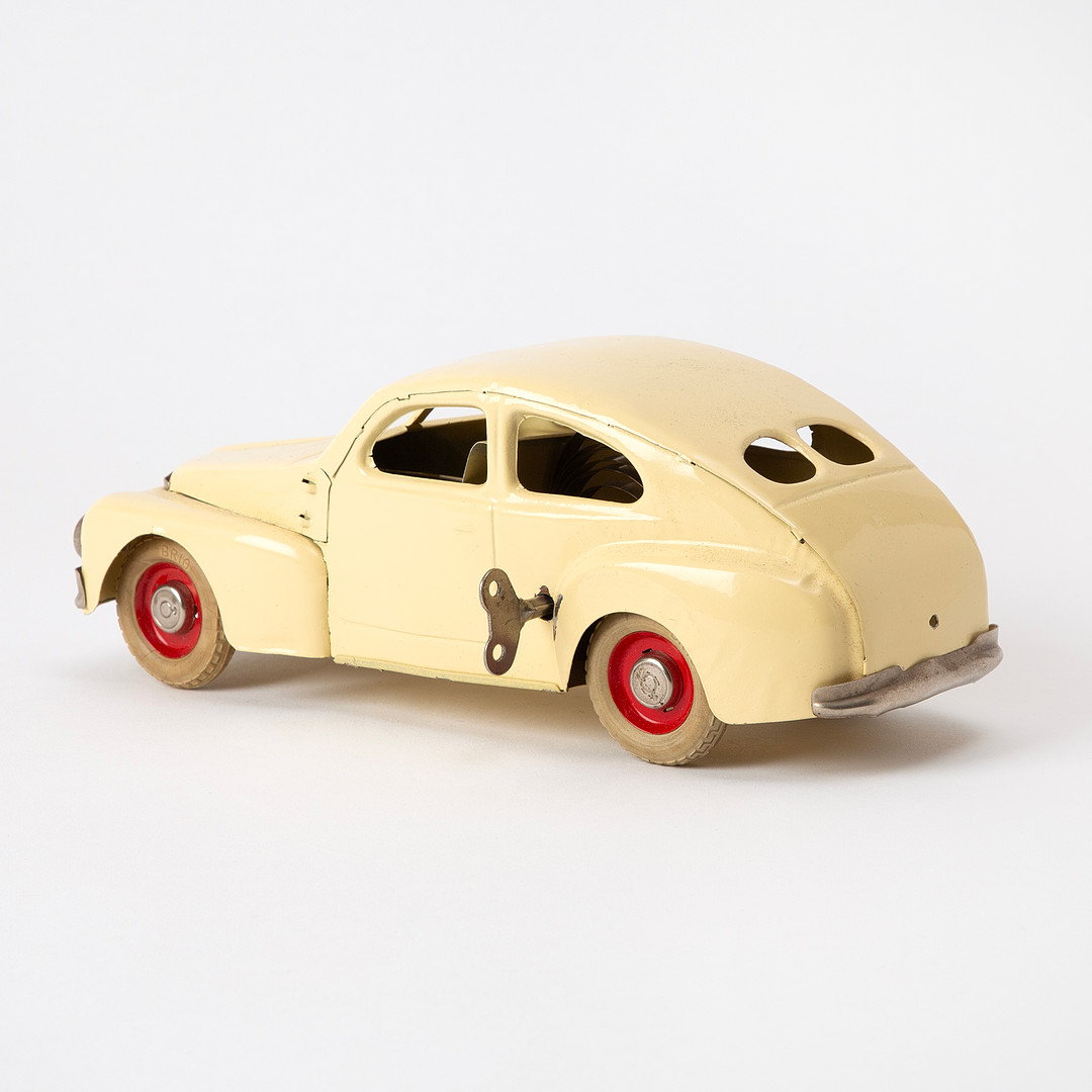 BRIO. "Volvo PV 444", leksaksbil, vitlackerad plåt, urverk, runt 1950.