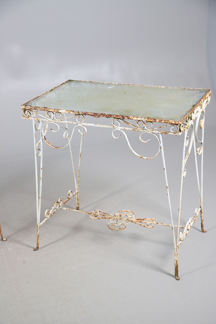 WROUGHT IRON GARDEN BENCH AND TABLE.