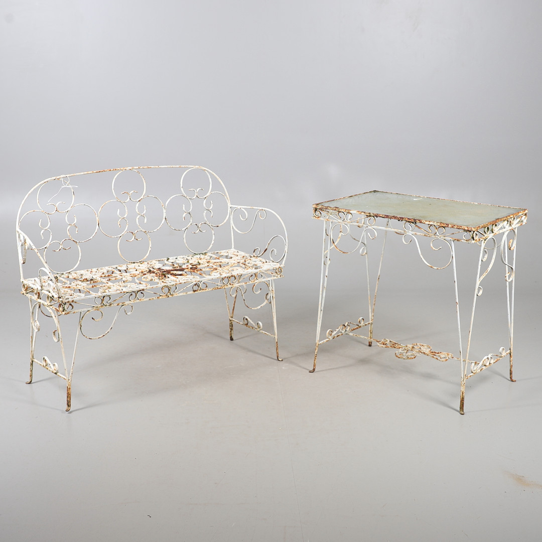 WROUGHT IRON GARDEN BENCH AND TABLE.