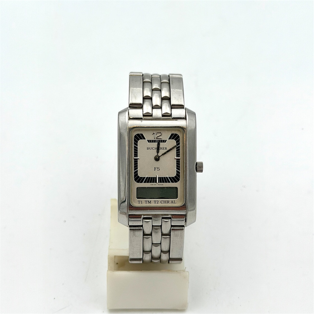 BUCHERER, Newton F5, armbandsur, quartz, stål.