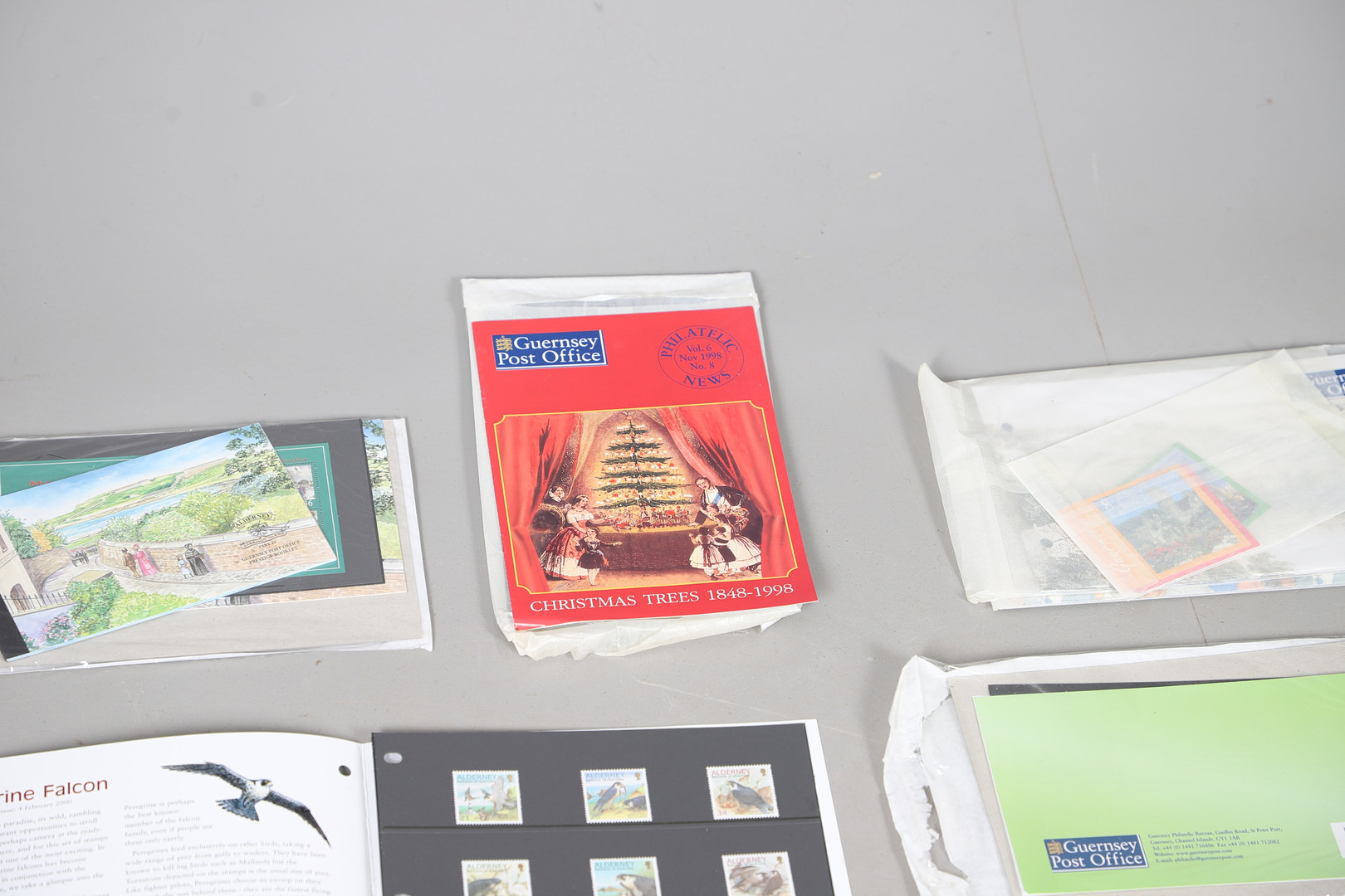 MINT STAMP PACKS - GUERNSEY & ALDERNEY, & COIN SETS.