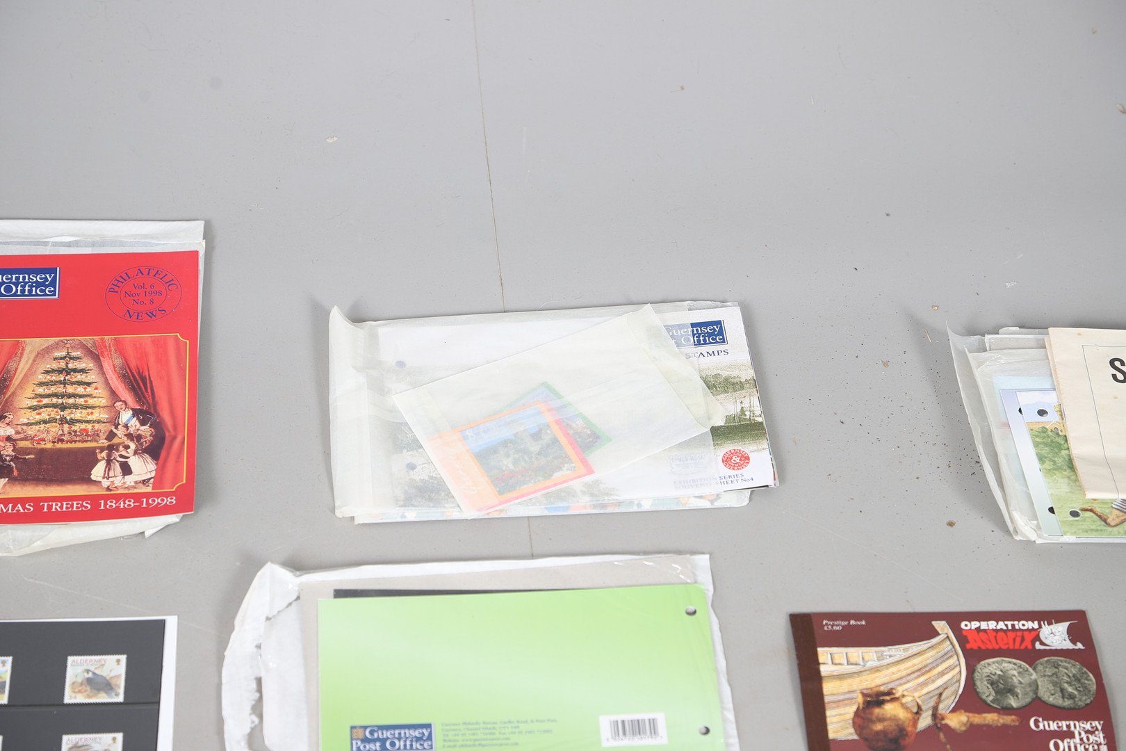 MINT STAMP PACKS - GUERNSEY & ALDERNEY, & COIN SETS.