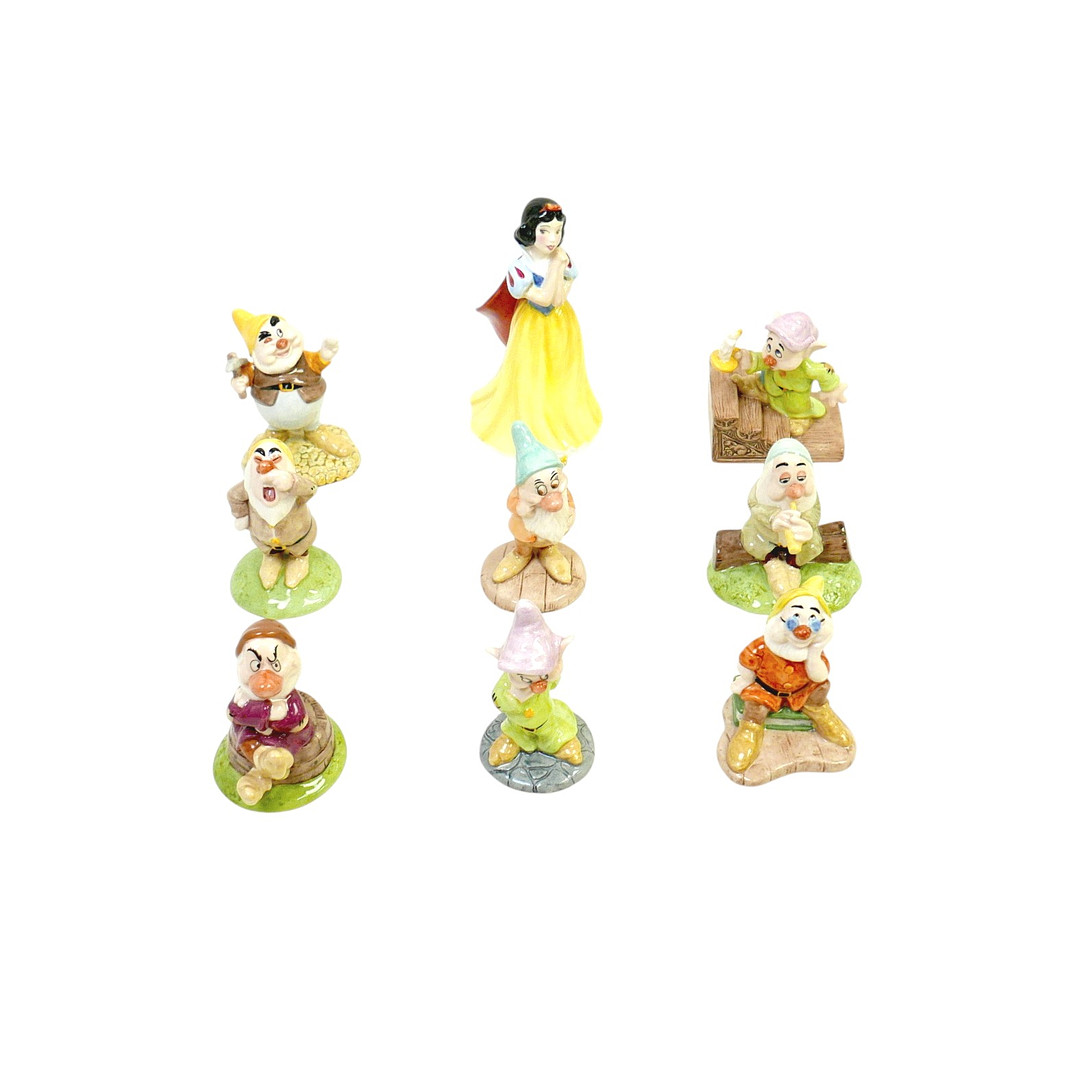NINE ROYAL DOULTON WALT DISNEY'S SNOW WHITE AND THE SEVEN DWARFS.