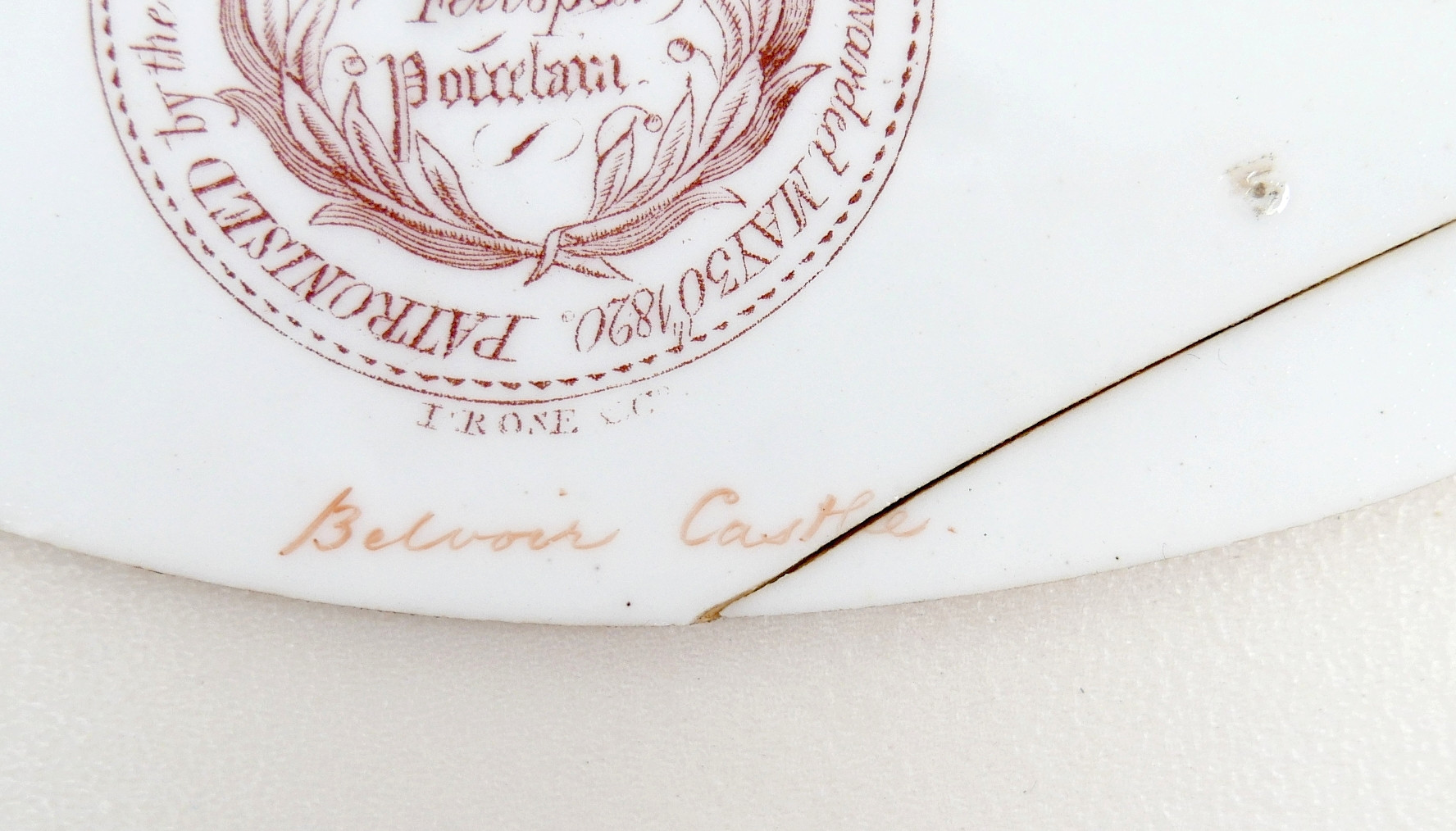 AN EARLY 19TH CENTURY HAND PAINTED COALPORT PORCELAIN LETTER RACK.