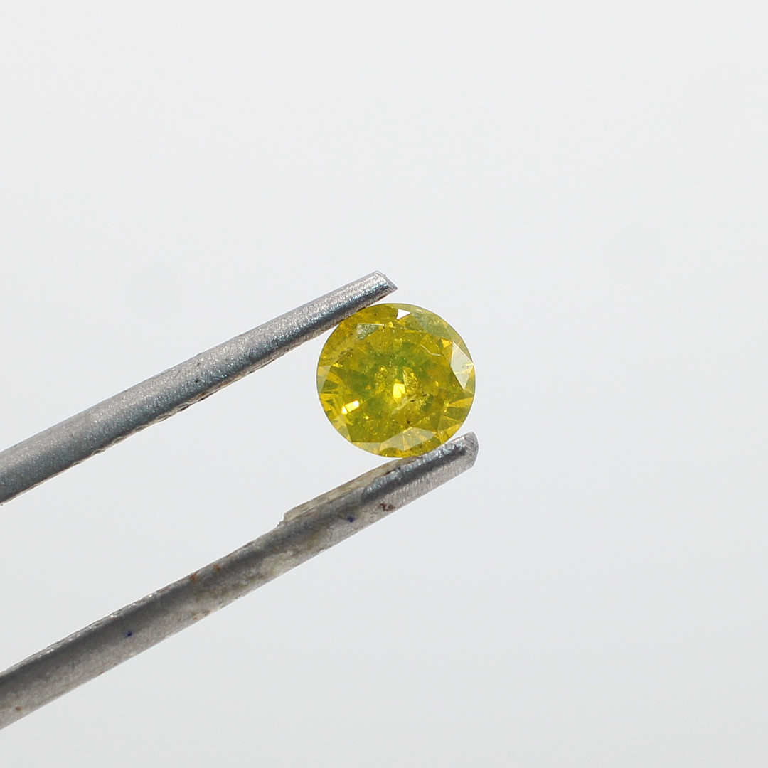 LOOSE FANCY YELLOW DIAMOND 0.53CT.