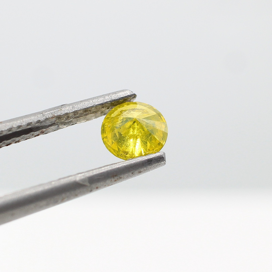 LOOSE FANCY YELLOW DIAMOND 0.53CT.
