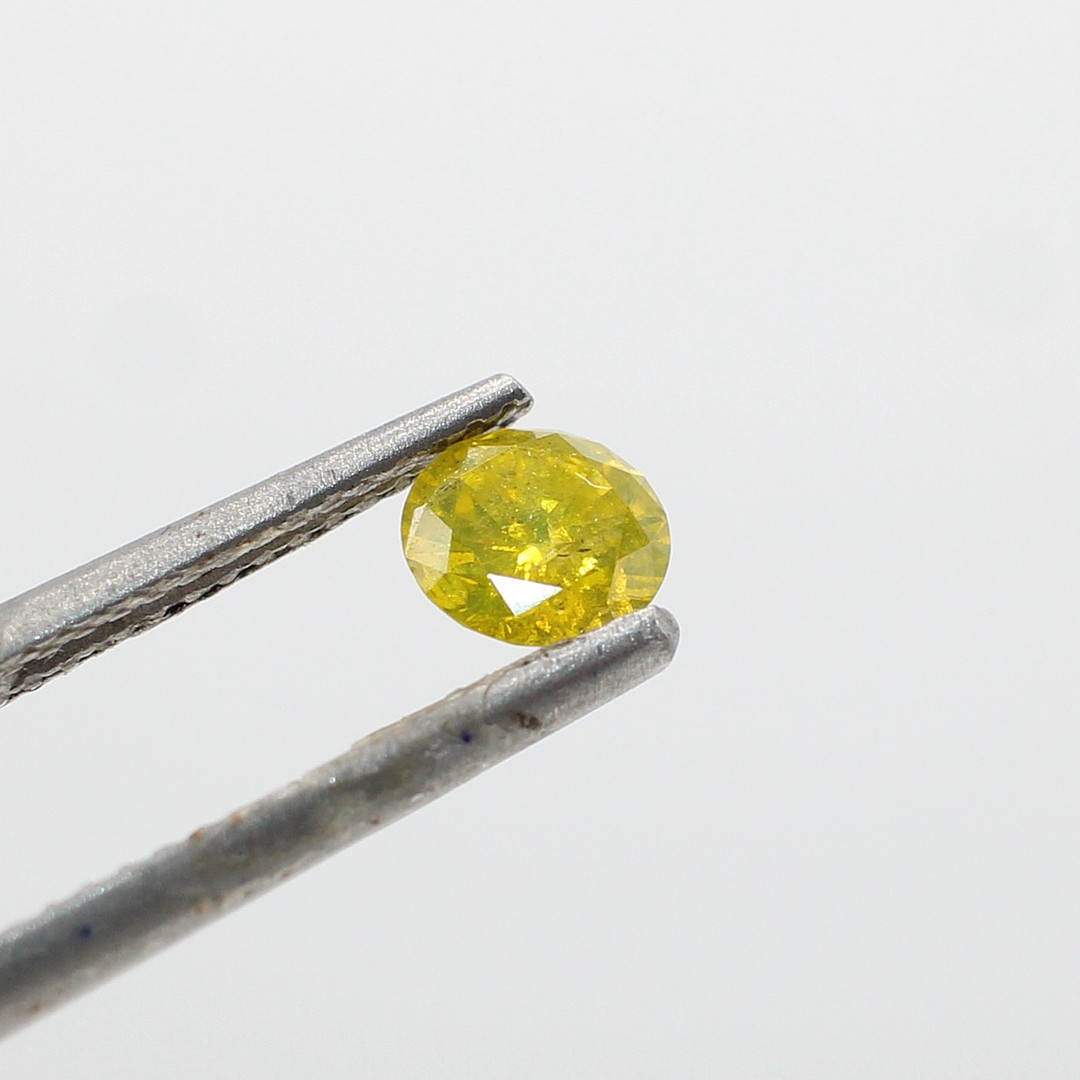 LOOSE FANCY YELLOW DIAMOND 0.53CT.