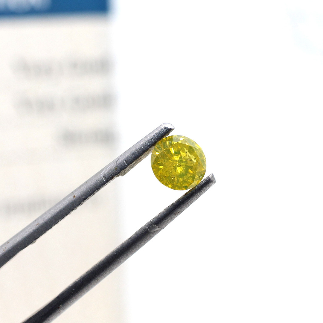 LOOSE FANCY YELLOW DIAMOND 0.53CT.