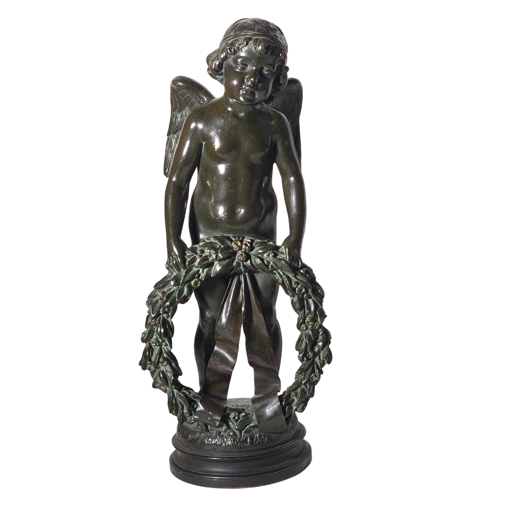 Angelote con guirnalda en bronce. Firmada Fremd. Principios de siglo XX.