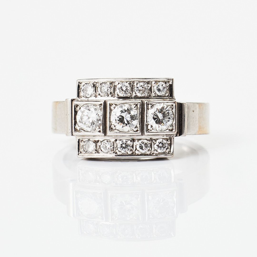 RING, 18 k rodierat vitguld, 13 briljanter totalt 0,65 ct (0,45+0,20 ct), enligt gravyr, BA Konstgjuteri HB, Stockholm 1998.
