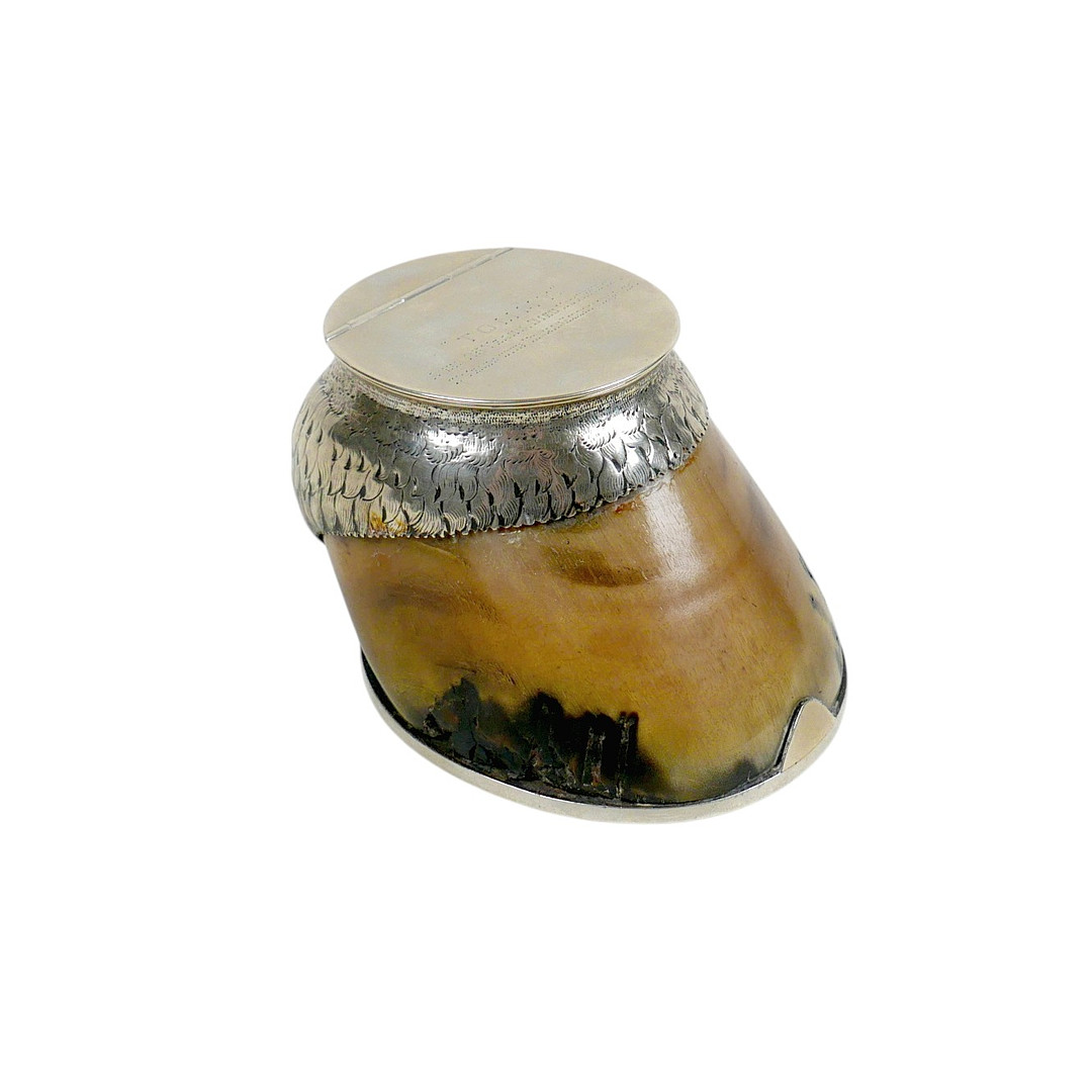 AN EARLY HORSE HOOF DESK INKWELL.