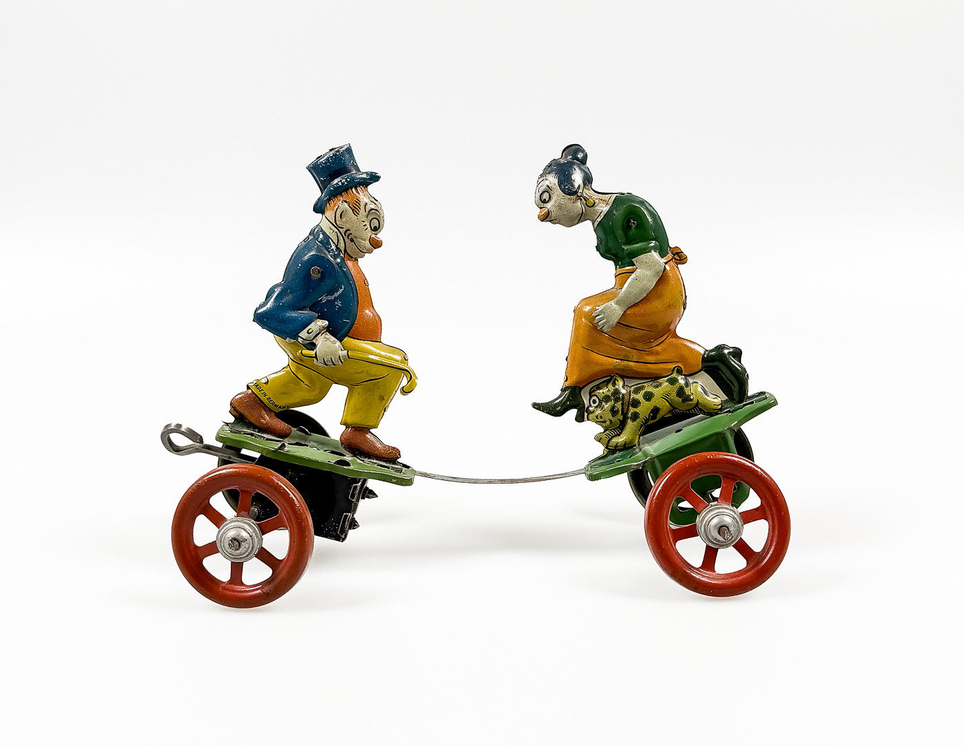 PLÅTLEKSAK, litograferad plåt, "Maggie & Jiggs" Tyskland, 1900-talets första hälft.