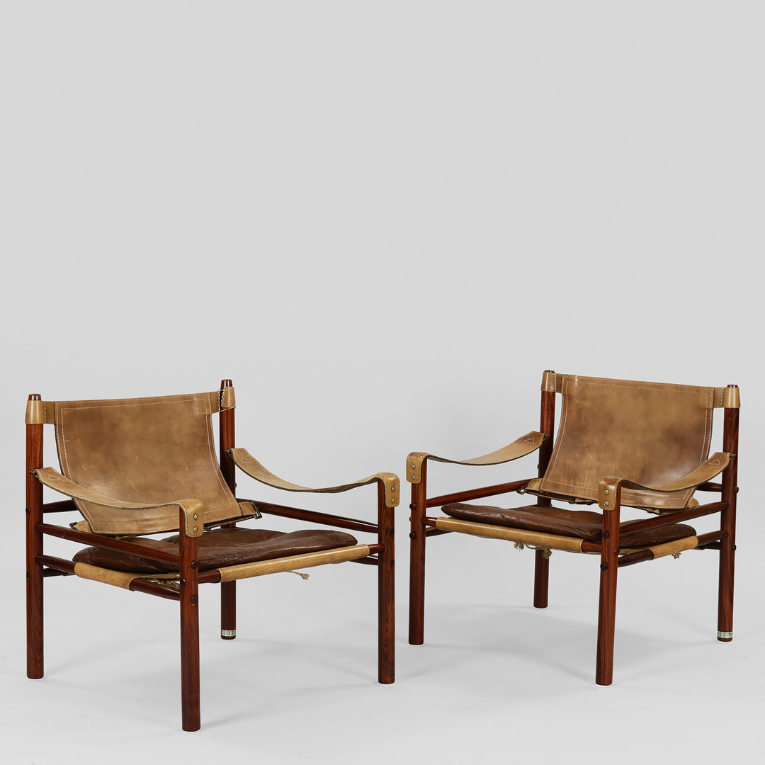 ARNE NORELL. "Sirocco", par lænestole af palisander og læder, Norell Möbler, Sverige, formgivet 1964 (2).