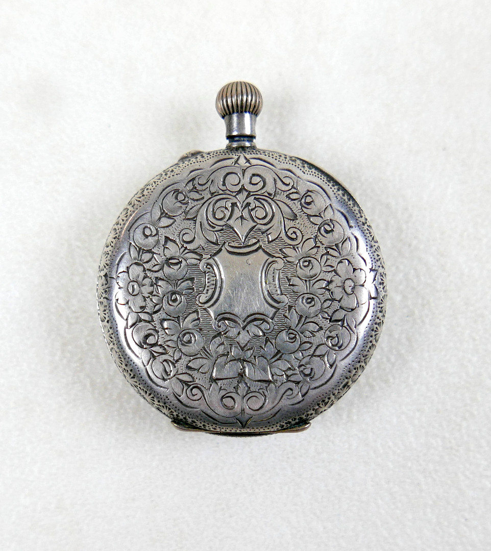 A 935 SILVER CASED SWISS LADY'S POCKET WATCH.