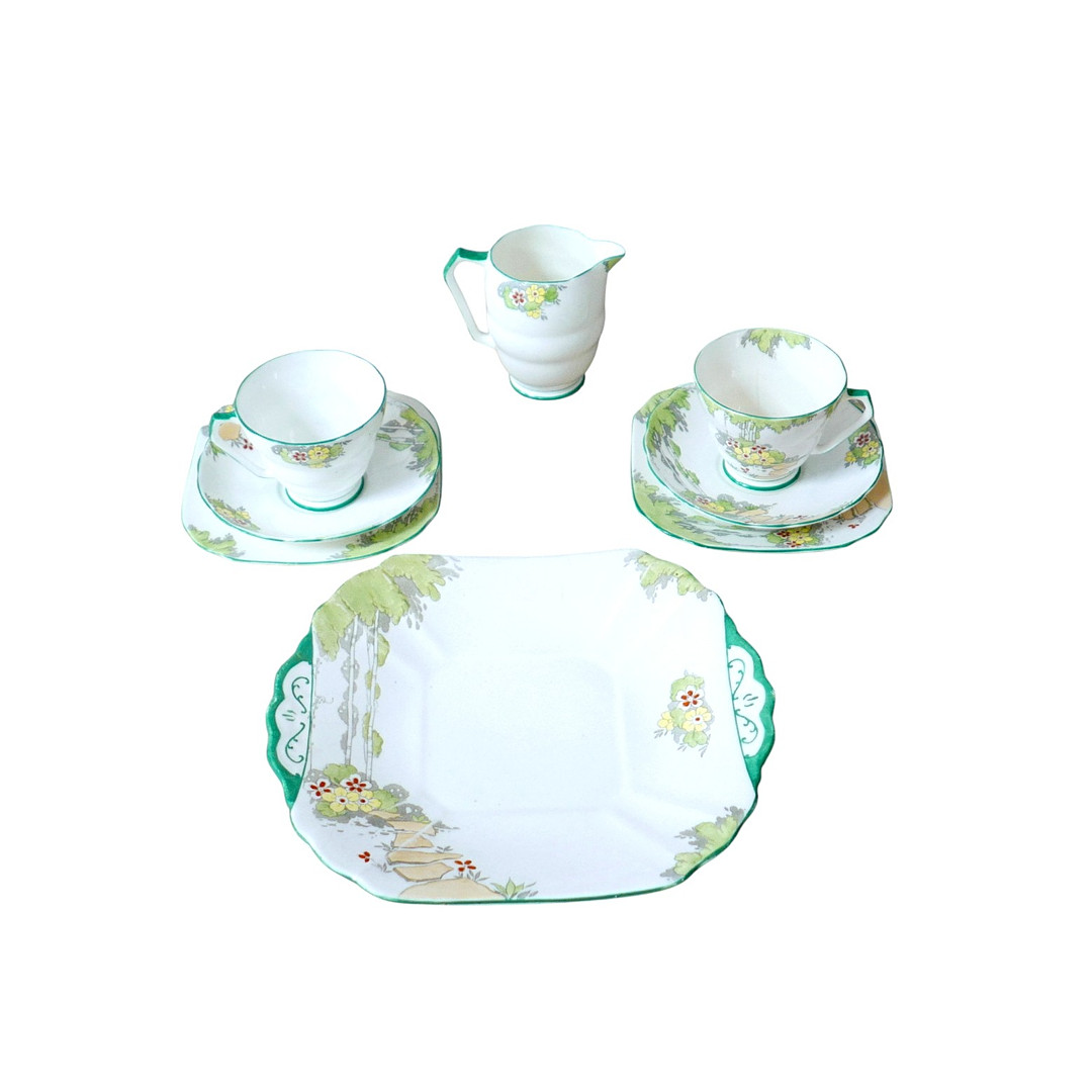 AN ART DECO RADFORD BONE CHINA TETE-A-TETE TEA SET.