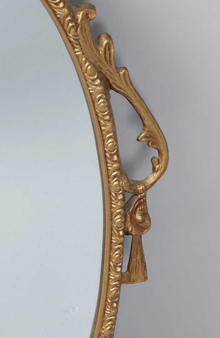 3 GILT OVAL MIRRORS.