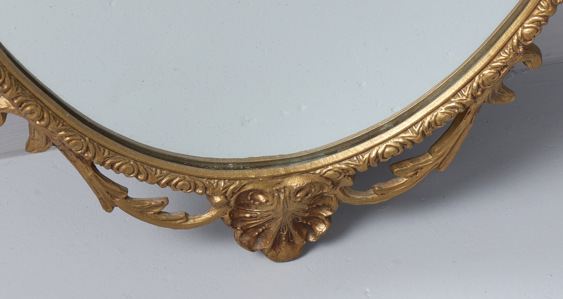 3 GILT OVAL MIRRORS.