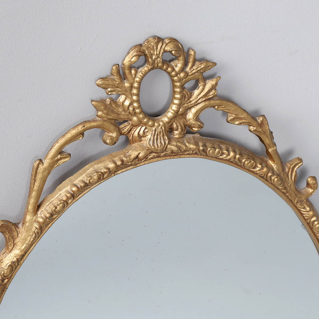3 GILT OVAL MIRRORS.
