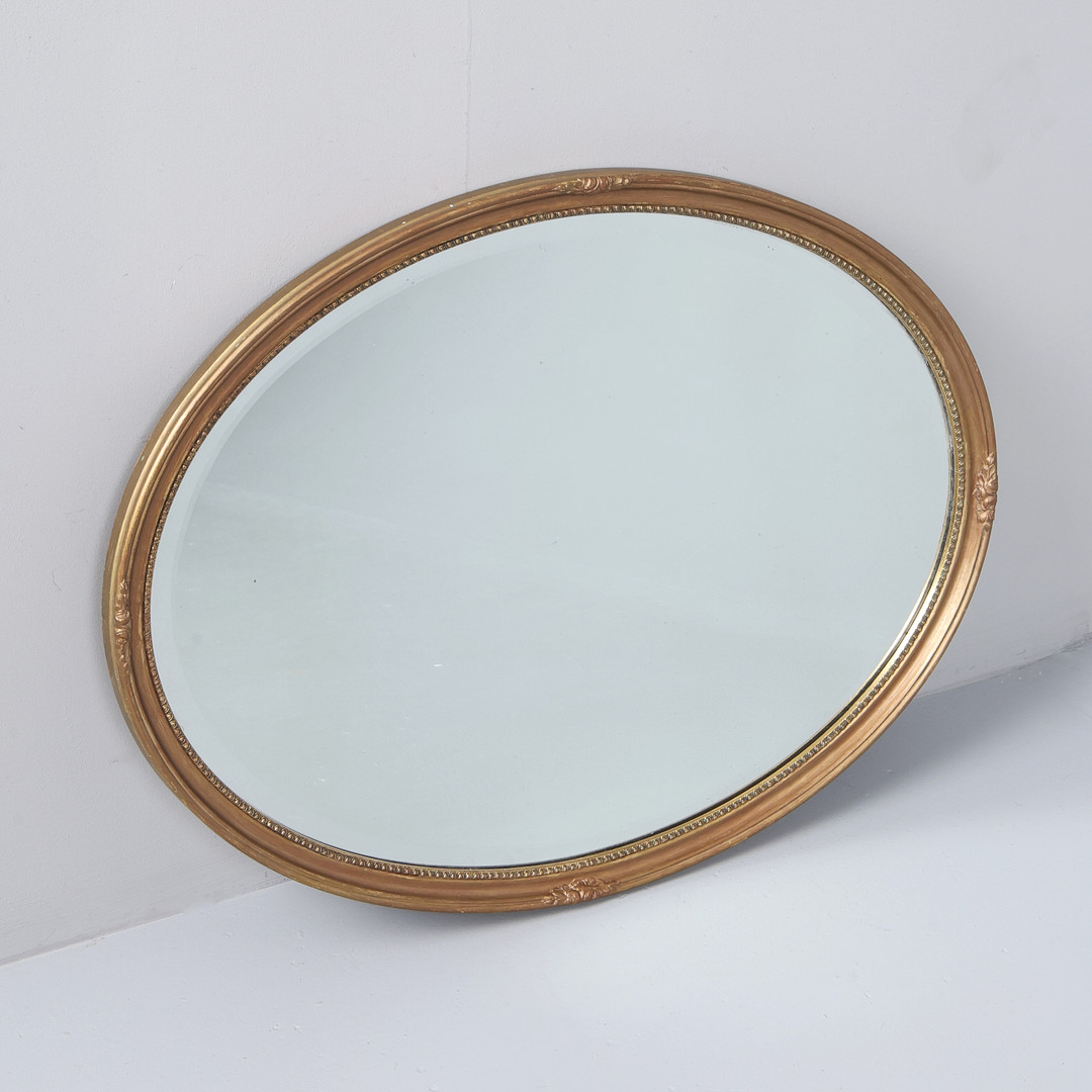 3 GILT OVAL MIRRORS.