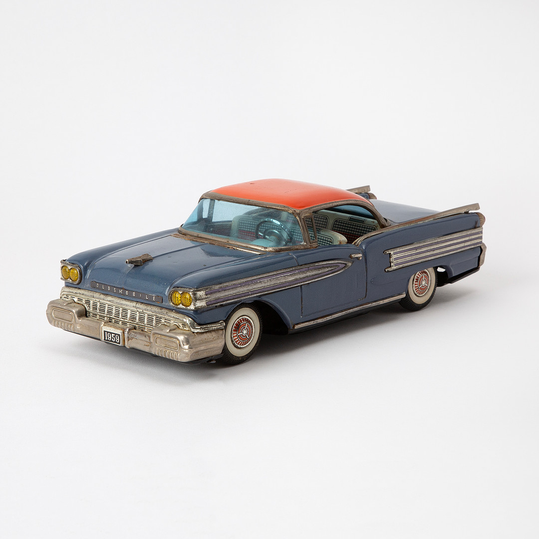 SANKEI-OKUMA. "Oldsmobile", friktion, litograferad plåt, Japan, 1959.