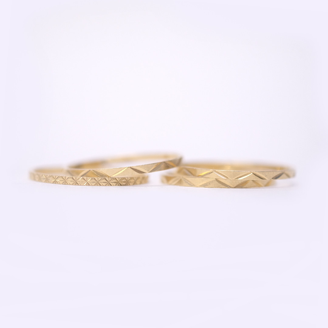 RING, 18K GULD, FYRA STYCKEN.