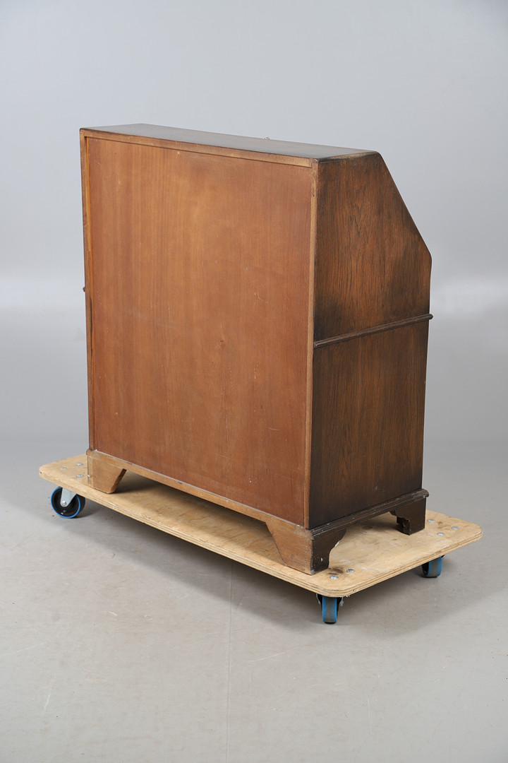 AN OAK FINISH BUREAU.