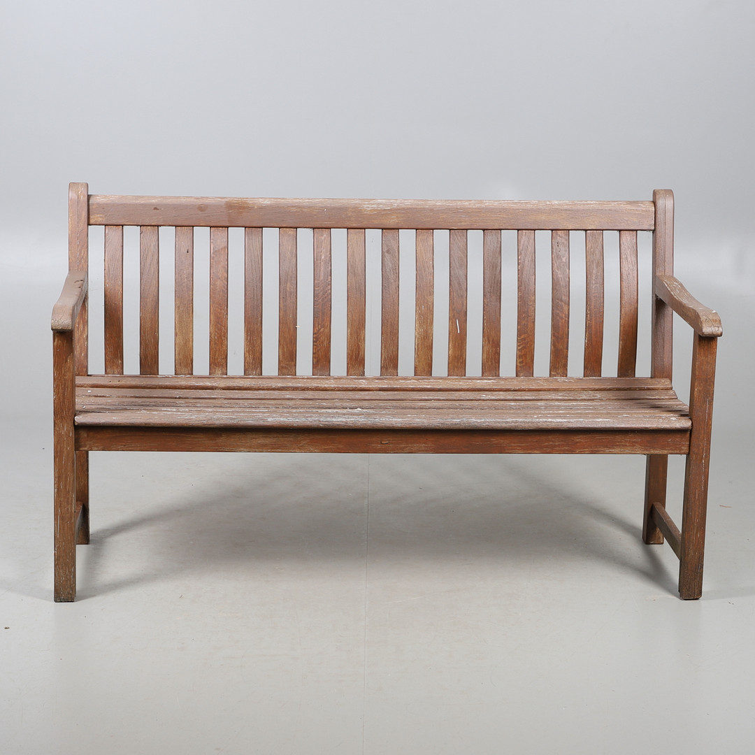 A HARDWOOD GARDEN BENCH.