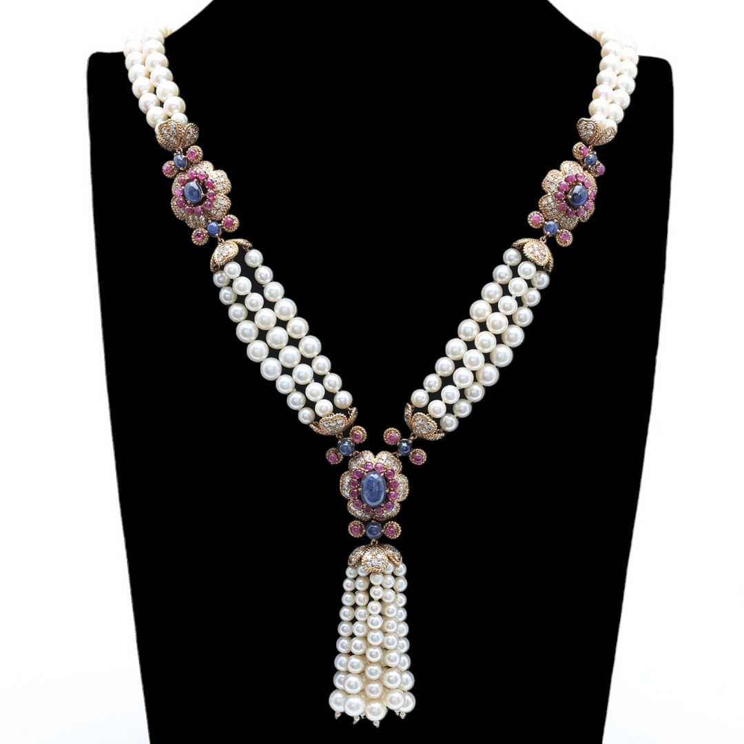 Pearls 'sautoir' necklace with a tassel and sapphires, rubies and diamonds.