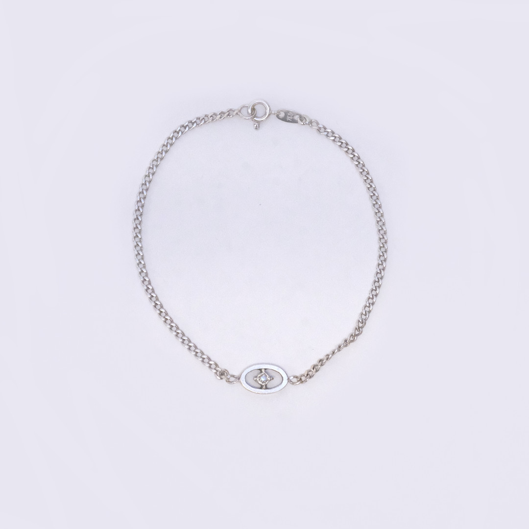 ARMBAND MED DIAMANT, 18K VITGULD.