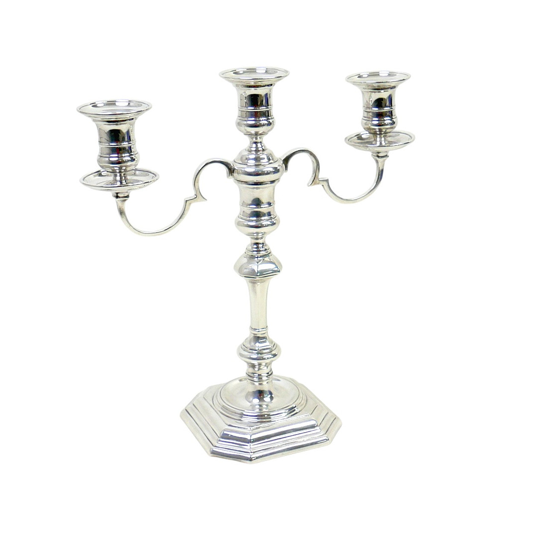 AN ELIZABETH II SILVER THREE BRANCH CANDELABRA.
