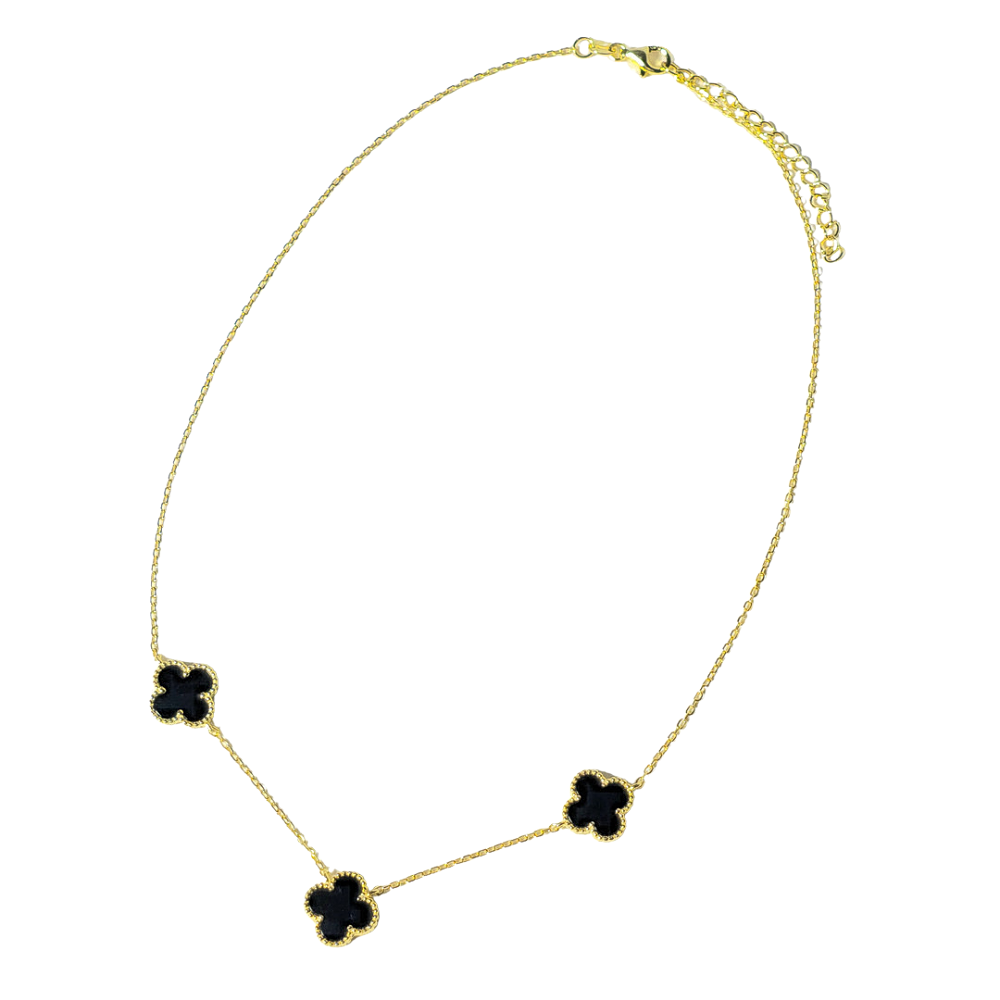 Collar trébol en plata bañada en oro y ónix.