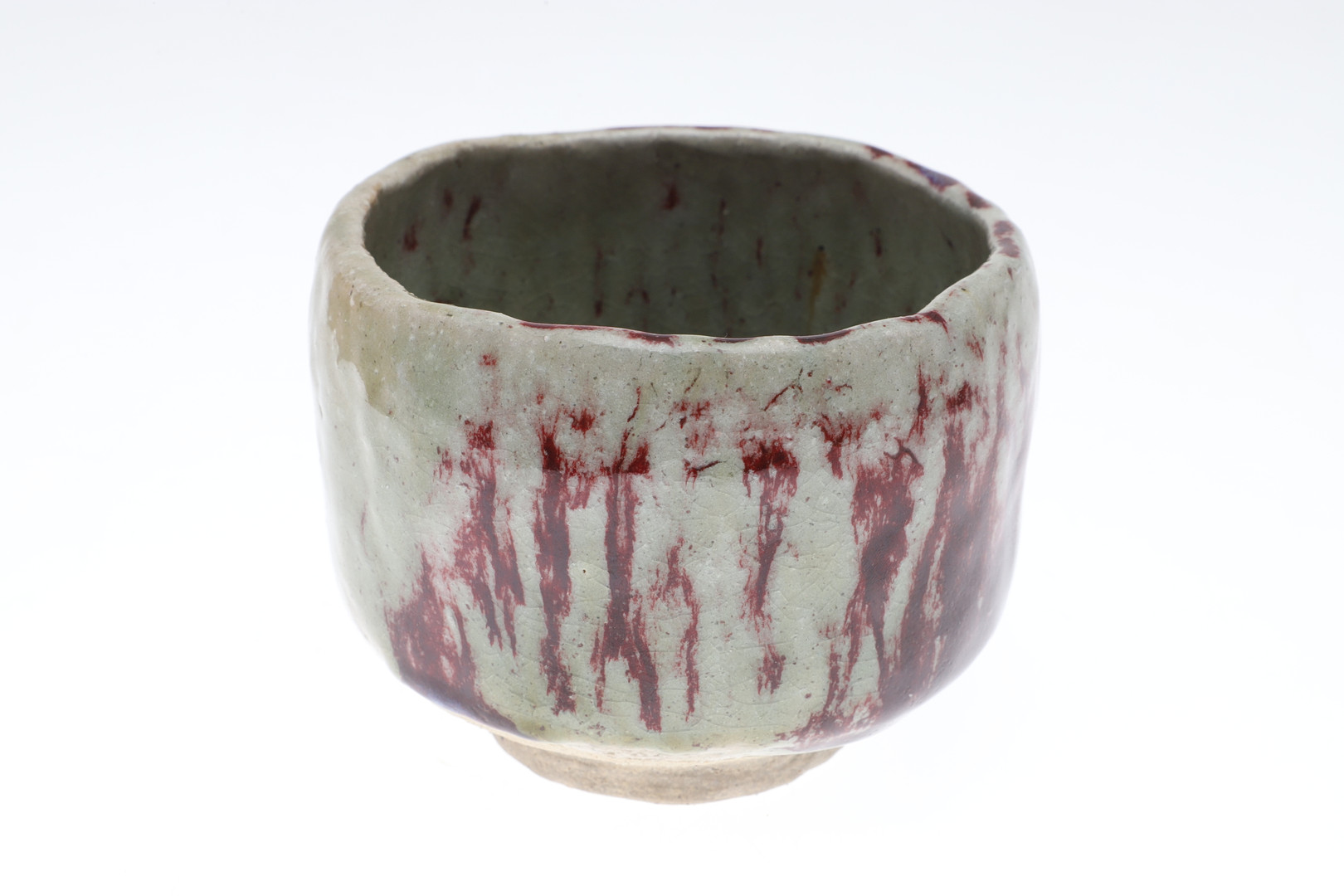 A 20TH CENTURY ORIENTAL BOXED GLAZED POTTERY FOOTED BOWL.