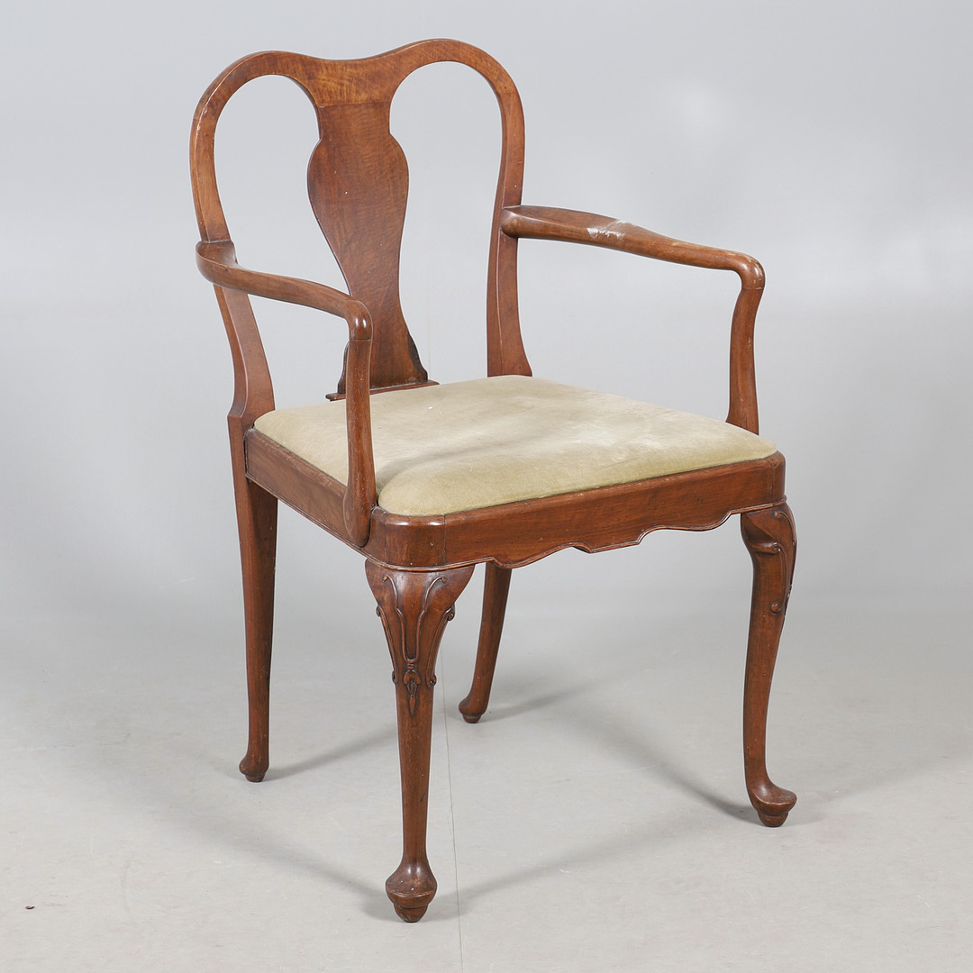 A WALNUT FRAMED ELBOW CHAIR IN THE GEORGE II STYLE.