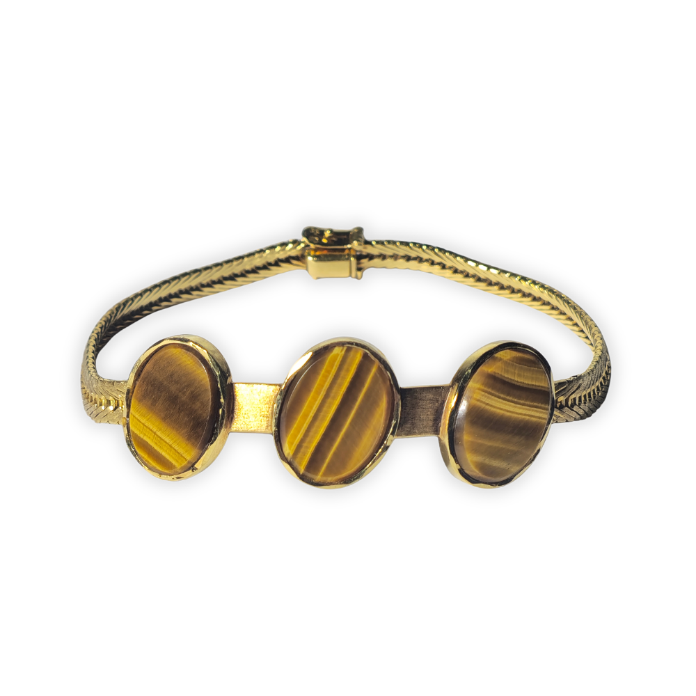Pulsera en oro de 18 K y ojo de tigre.