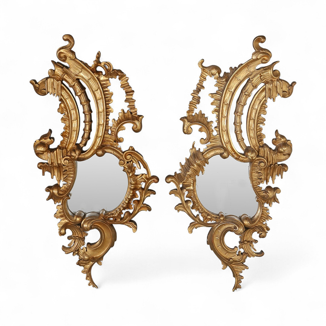 Pair of mirrors with Belle Époque Louis XV style frames in carved and gilt wood, early 20th Century.
