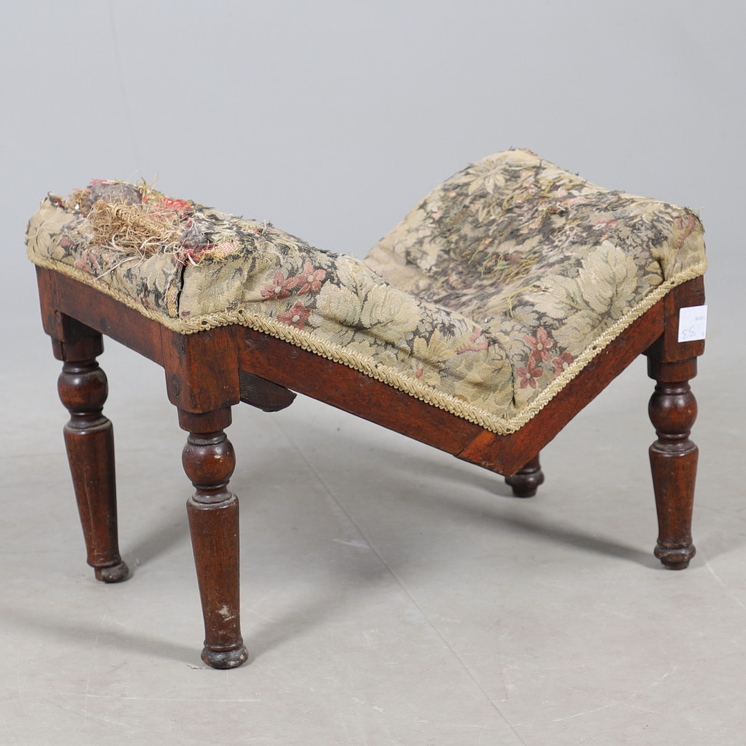 A 19TH CENTURY MAHOGANY GOUT STOOL.