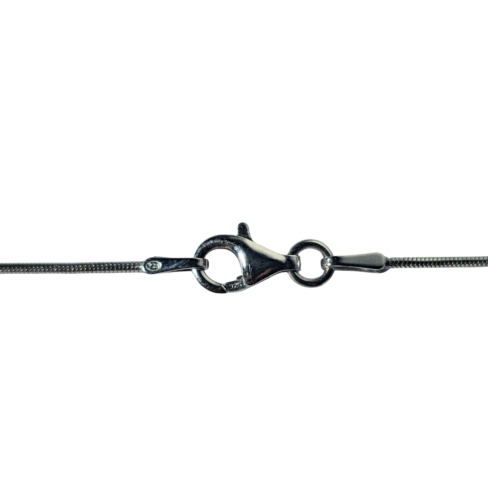 Cadena en plata y colgante en cruz con citrinos.