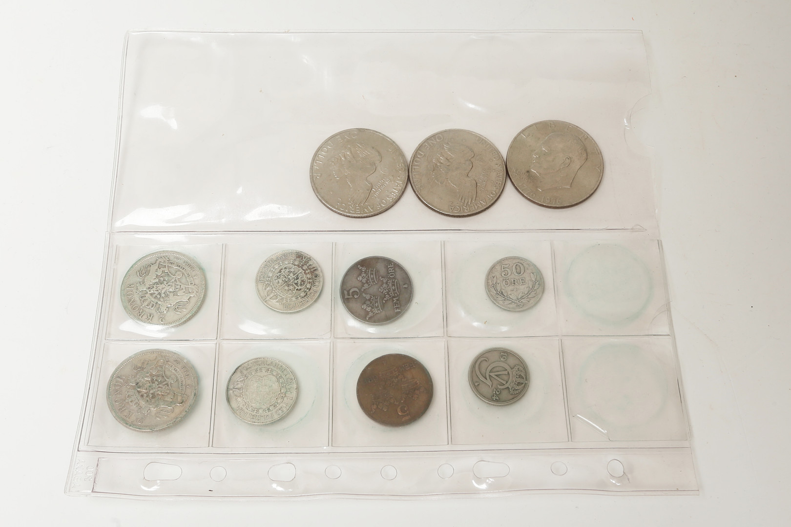MYNT 11 st, delvis silver, bland annat silverdollar.